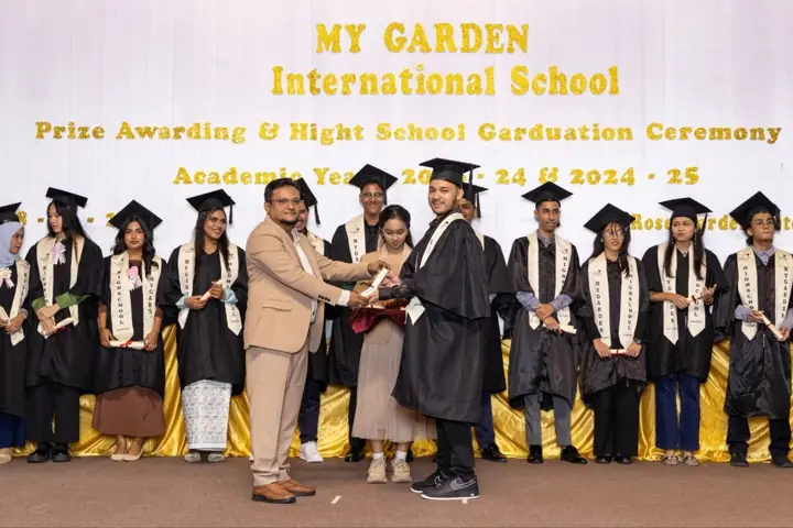 Graduating students receiving certificates on stage